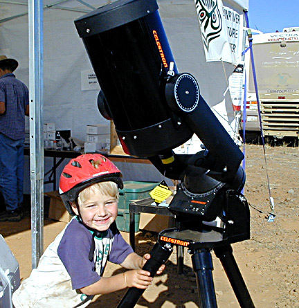my youngest son
shows off the Celestron Schmidt Cass that I won in 2001