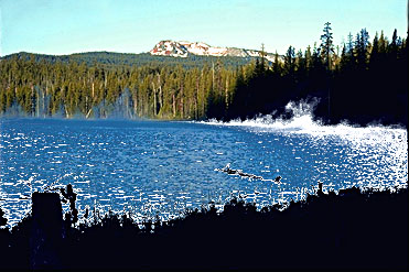 Maidu Lake above Miller Lake shows Tipsoo Peak, where the Pacific Crest Trail in Oregon reaches its highest point